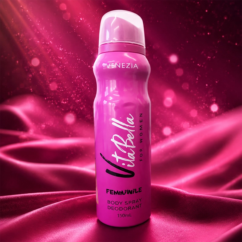 Front view of pink Vita Bella Venezia 150ml feminine body spray deodorant standing on luxury magenta satin fabric with glowing bokeh light effects.