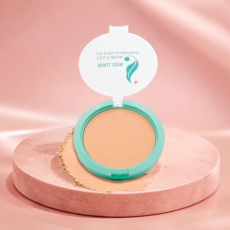 Shall Coin Turquoise Compact Powder on Shimmering Beige Silk Fabric
